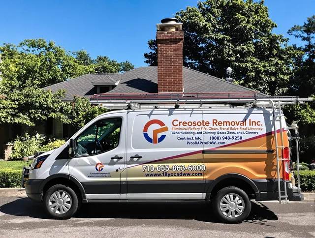 Maple Heights Chimney Sweep technician removing creosote safely in Maple Heights, OH