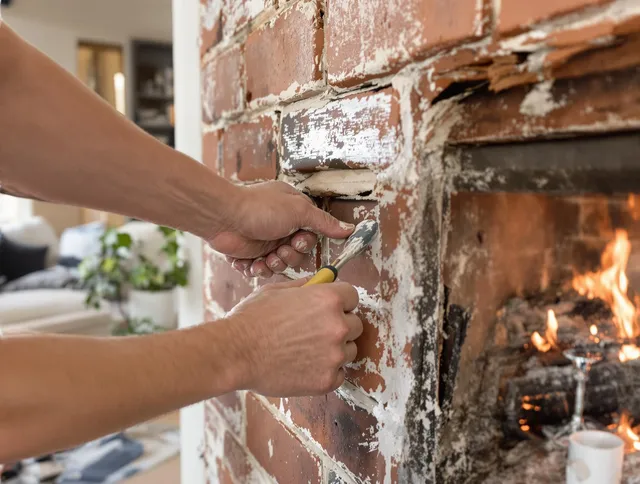 Routine fireplace repair by Maple Heights Chimney Sweep in Maple Heights, OH